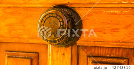 close up on a round door handle close up on a round door handle 42742316