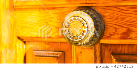 close up on a round door handle close up on a round door handle 42742318