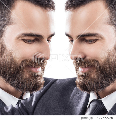 Mmale face before and after cosmetic nose surgery. 42745576