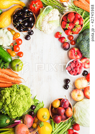 Summer fruits vegetables on table 42745988
