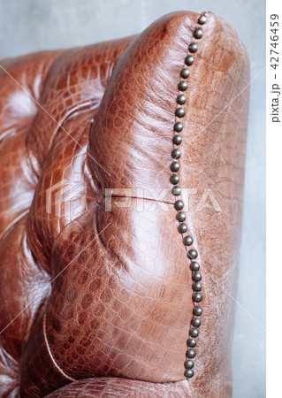 Closeup texture of vintage brown leather sofa Closeup texture of vintage brown leather sofa 42746459