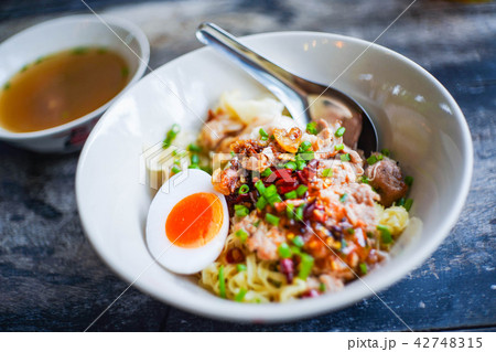 dried yellow noodle pork bone with soup dried yellow noodle pork bone with soup 42748315