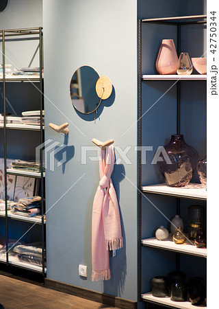 Apartment with modern armchairs and blue wall 42750344