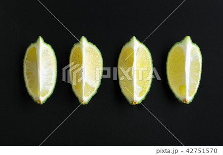 Four slices of lime 42751570