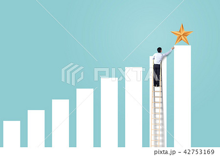 businessman climb up on ladder to reach star, succ 42753169