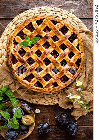 Fruit pie. Sweet pie, tart with fresh plums Fruit pie. Sweet pie, tart with fresh plums 42755892