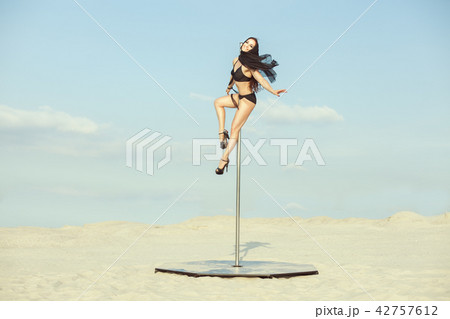 Woman dances sex dance in the desert. Woman dances sex dance in the desert. 42757612