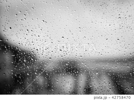 Raindrops on glass Raindrops on glass 42758470