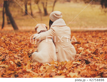 Mistress Hugging with Dog 42758896
