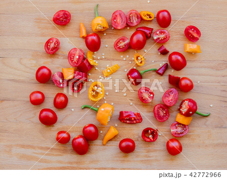 cut chilli peppers and tomatoes 42772966