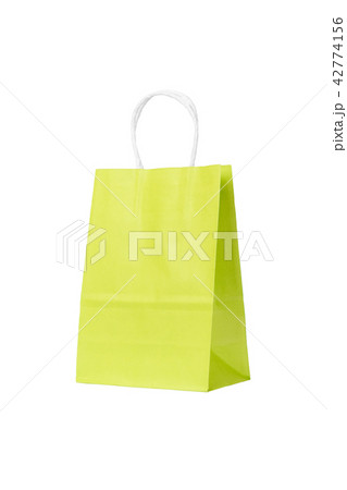 Green shopping paper bag isolated background 42774156