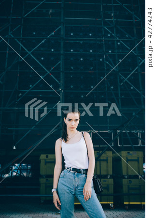 Beautiful young woman standing Beautiful young woman standing 42774243