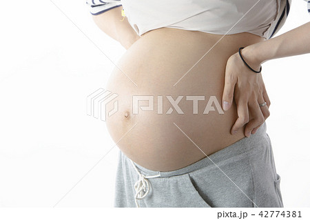妊娠している女性のお腹の写真素材
