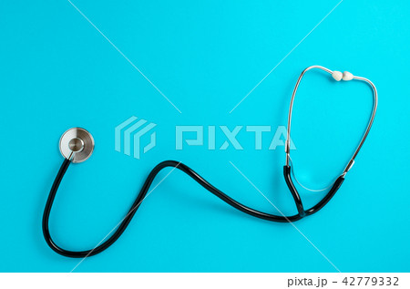 Stethoscope on blue background 42779332