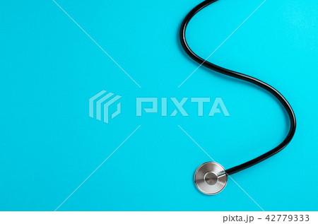 Stethoscope on blue background 42779333