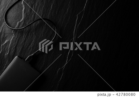 External hard drive on dark background External hard drive on dark background 42780080