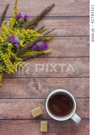 Cup of coffee and a cozy Autumn composition,  42783321