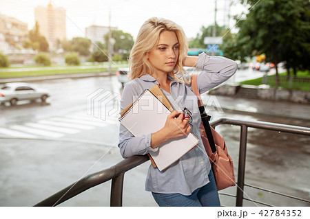 Enthusiastic Serious beautiful young girl Enthusiastic Serious beautiful young girl 42784352