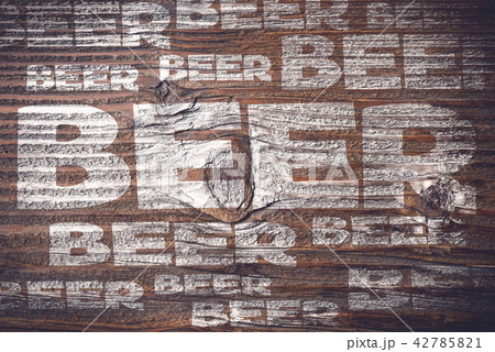 Beer menu on an old wooden plank Beer menu on an old wooden plank 42785821