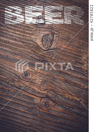 Beer menu on an old wooden plank Beer menu on an old wooden plank 42785822