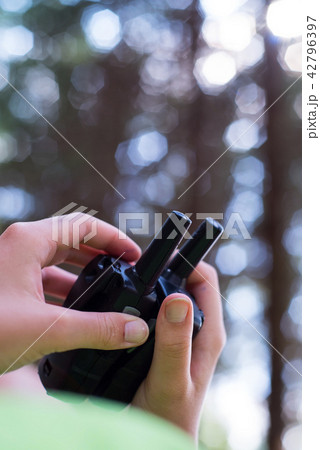 Transmitters in hand. 42796397
