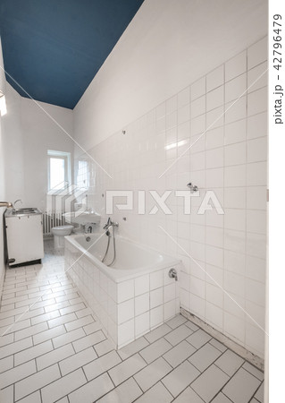 old white tiled bathroom with bathtub - renovation old white tiled bathroom with bathtub - renovation 42796479
