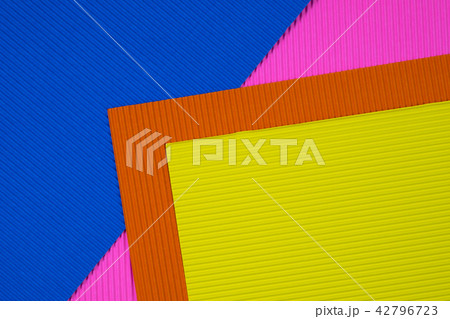 Multi coloured corrugated paper background 42796723