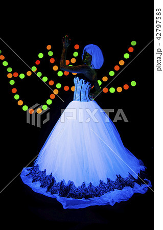 Wedding photo session of young bride Neon photography bright colorful on a dark background in 42797583