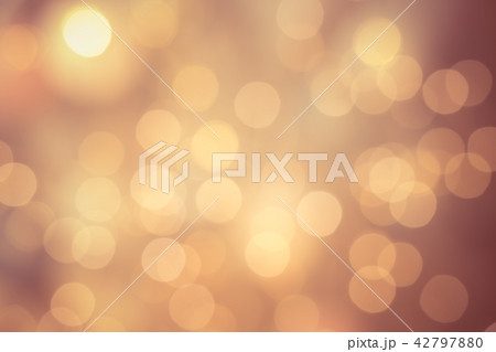 Bright bokeh on vivid champagne color background Bright bokeh on vivid champagne color background 42797880