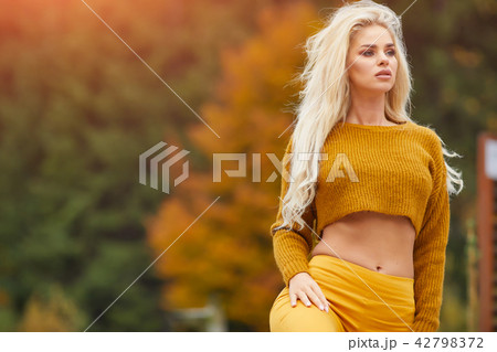 beautiful girl enjoying the sunny autumn day beautiful girl enjoying the sunny autumn day 42798372