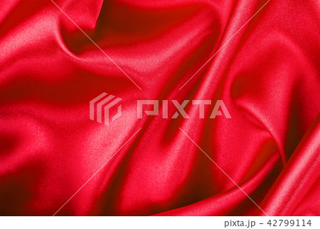 red satin or silk fabric isolated red satin or silk fabric isolated 42799114