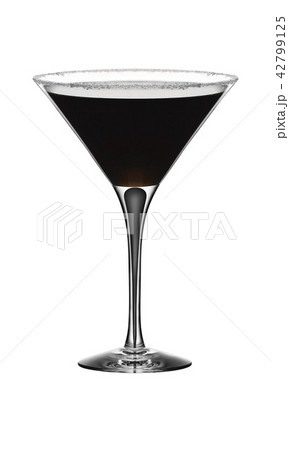 Ice cold glass of golden cocktail Ice cold glass of golden cocktail 42799125