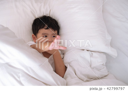 3 years old Asian boy at home on the bed 3 years old Asian boy at home on the bed 42799797