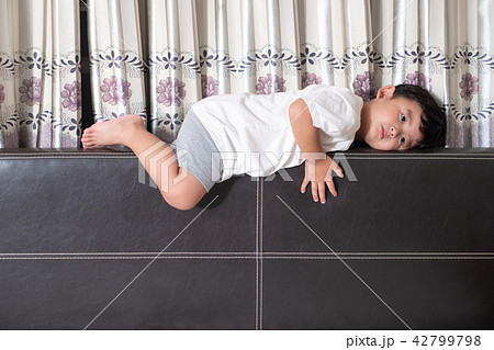 3 years old Asian boy at home on the bed 3 years old Asian boy at home on the bed 42799798