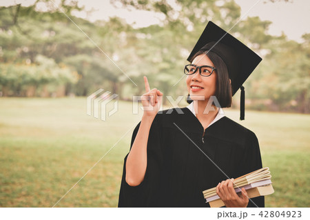 Graduation Concept. Graduated students on graduation day. Asian Graduation Concept. Graduated students on graduation day. Asian 42804923