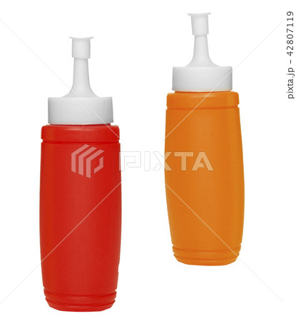 Ketchup and mustard bottles isolated on a white Ketchup and mustard bottles isolated on a white 42807119