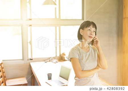 woman working at home woman working at home 42808392