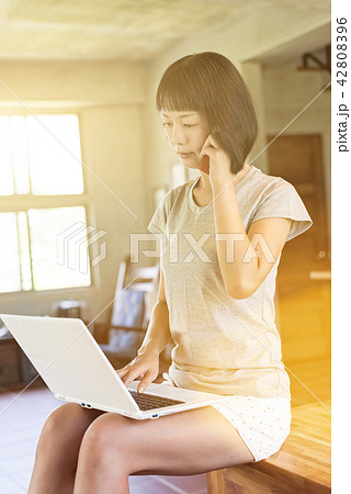 woman working at home woman working at home 42808396