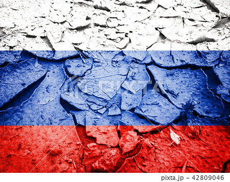 Russian flag on dry cracked earth Russian flag on dry cracked earth 42809046
