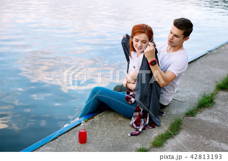 Nice young man holding a plaid Romantic date. 42813193