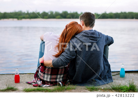 Nice peaceful couple looking at the river 42813222