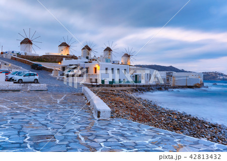 Traditional windmills at sunrise in Mykonos, Greece 42813432