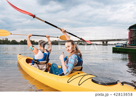 Beaming appealing woman feeling amazing after nice river ride 42813658