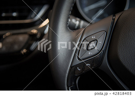 Modern car illuminated dashboard and Electric powe 42818403