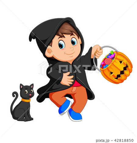 Cute kid witch walking in black cloak 42818850