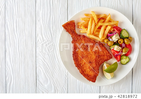 fried flounder with potato and salad fried flounder with potato and salad 42818972