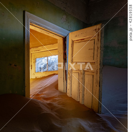 Sand has invaded and taken over these rooms 42819338