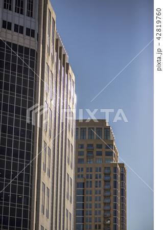 High rise buildings with sun reflection downtown High rise buildings with sun reflection downtown 42819760