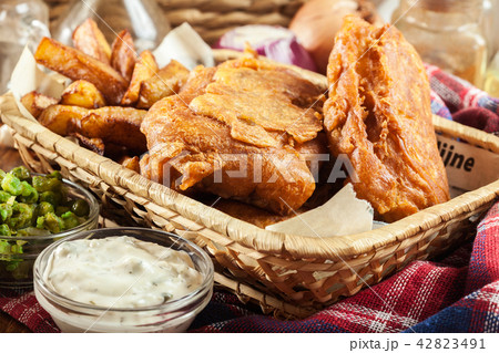 Traditional fish in beer batter and chips 42823491