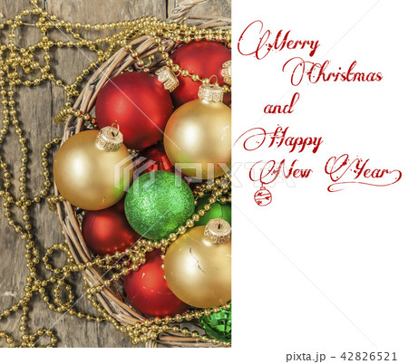 Christmas balls red, gold, green, beads lie Christmas balls red, gold, green, beads lie 42826521